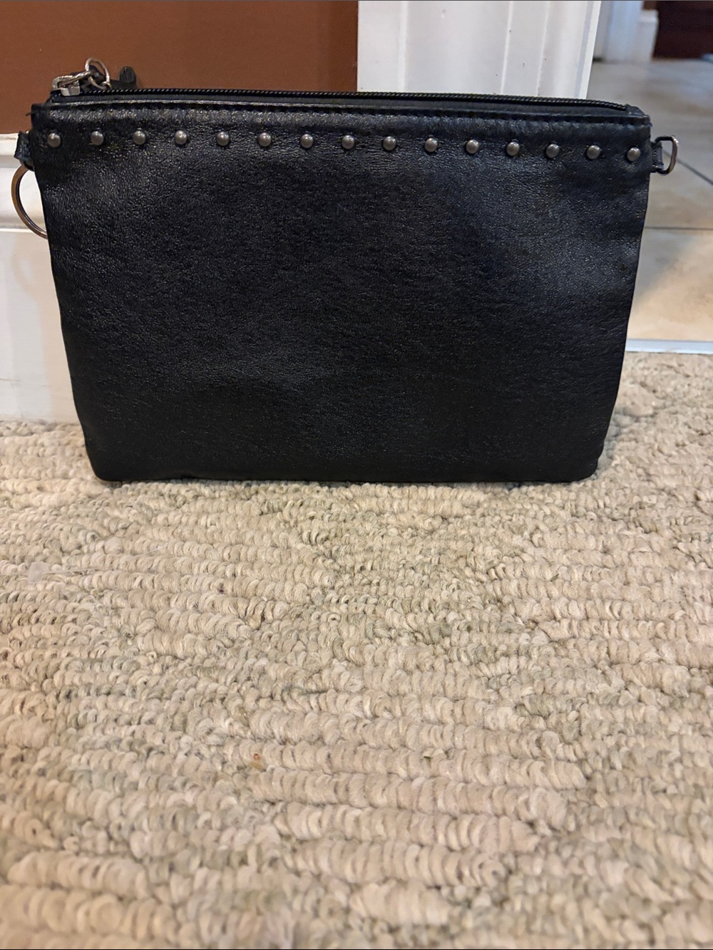 The Sak Black Stud-Trim Leather Wristlet Clutch